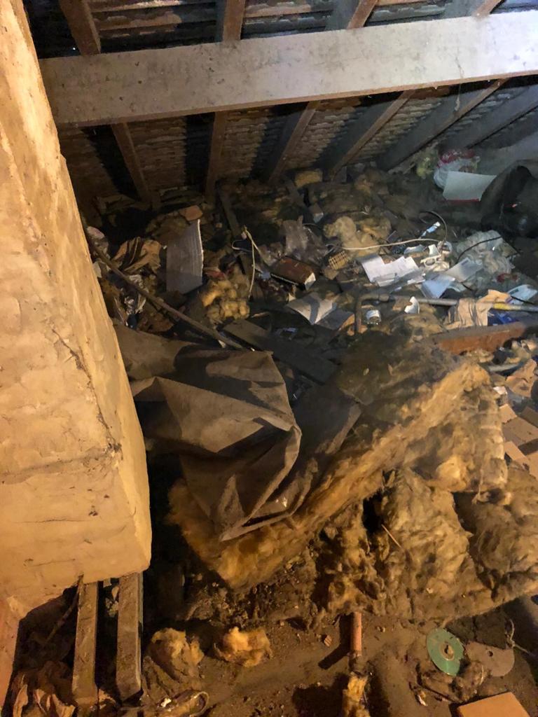 Old insulation with built up debris